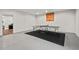 Spacious basement area featuring a ping pong table and a basketball hoop for indoor recreation at 200 Callandale Ln, Durham, NC 27703