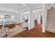 Spacious living room featuring hardwood floors, elegant furniture, and an open layout at 200 Callandale Ln, Durham, NC 27703