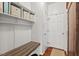Mudroom area with bench seating, storage cubbies, and access to the home's interior at 200 Callandale Ln, Durham, NC 27703