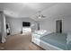 Main bedroom with king bed, dresser, and large windows at 222 Sapphire Rd, Burlington, NC 27215