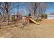 Spacious backyard with playset and open area at 2419 Highland Ave, Durham, NC 27704