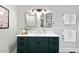 Elegant bathroom with a double vanity and stylish mirrors at 2419 Highland Ave, Durham, NC 27704