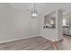 Dining area with hardwood floors and kitchen access at 243 New Bern Pl # 301, Raleigh, NC 27601