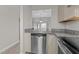 Kitchen with granite countertops, stainless steel appliances, and dishwasher at 243 New Bern Pl # 301, Raleigh, NC 27601