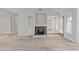 Spacious living room features a fireplace and built-in shelving at 243 New Bern Pl # 301, Raleigh, NC 27601