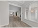 Open living area with hardwood floors and kitchen views at 243 New Bern Pl # 301, Raleigh, NC 27601