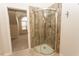 Corner shower in bathroom with glass door and view to bedroom at 270 W Silverado Ct, Kenly, NC 27542