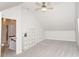 Bright bedroom boasts neutral paint, fan, and built-in shelving at 270 W Silverado Ct, Kenly, NC 27542