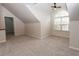 Bedroom showcasing neutral walls, carpet and a large arched window at 270 W Silverado Ct, Kenly, NC 27542