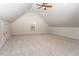 Large bonus room with vaulted ceiling, carpet, recessed lighting, and a window at 270 W Silverado Ct, Kenly, NC 27542