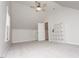 Spacious bonus room with carpet, dormer window, vaulted ceilings, and storage shelves at 270 W Silverado Ct, Kenly, NC 27542