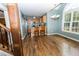 Bright dining area with hardwood floors, stainless appliances, and a large window at 270 W Silverado Ct, Kenly, NC 27542
