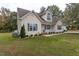 Charming home with a manicured lawn, a welcoming front porch, and a well-maintained exterior at 270 W Silverado Ct, Kenly, NC 27542
