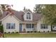 Charming two-story house with a landscaped lawn and attractive curb appeal at 270 W Silverado Ct, Kenly, NC 27542