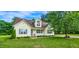 Charming, well-maintained home with landscaped yard and inviting front porch at 270 W Silverado Ct, Kenly, NC 27542