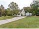 House exterior with a large front yard and driveway, RV parking at 270 W Silverado Ct, Kenly, NC 27542