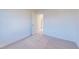 Spacious bedroom with carpeted floor and access to a bathroom at 308 Johnson Ridge Way, Four Oaks, NC 27524