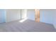 Bright bedroom featuring neutral walls and carpet at 308 Johnson Ridge Way, Four Oaks, NC 27524