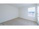 Bright bedroom featuring a window and neutral walls at 308 Johnson Ridge Way, Four Oaks, NC 27524