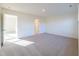 Spacious bedroom with neutral carpeting and an ensuite bathroom at 308 Johnson Ridge Way, Four Oaks, NC 27524