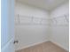 Walk-in closet with wire shelving; provides ample storage at 308 Johnson Ridge Way, Four Oaks, NC 27524