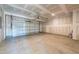 Unfinished garage with automatic door opener at 308 Johnson Ridge Way, Four Oaks, NC 27524