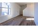 Bright living room with hardwood floors and neutral walls at 308 Johnson Ridge Way, Four Oaks, NC 27524