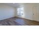 Bright office space with hardwood floors and neutral walls at 308 Johnson Ridge Way, Four Oaks, NC 27524