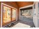 Relaxing screened porch with brick flooring and access to backyard at 2901 Shagbark Ln, Graham, NC 27253