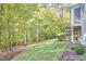 Spacious backyard with wooded backdrop and deck at 4034 S Mcdowell, Pittsboro, NC 27312