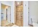 Large walk-in shower with tiled walls and built-in seat at 4034 S Mcdowell, Pittsboro, NC 27312