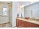 Bathroom with double vanity, shower and granite countertop at 4034 S Mcdowell, Pittsboro, NC 27312