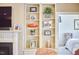 Stylish built-in shelving with Gathering photos and decor at 4034 S Mcdowell, Pittsboro, NC 27312