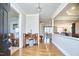 Bright entryway with hardwood floors and a view into the living area at 4034 S Mcdowell, Pittsboro, NC 27312
