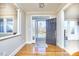 Hardwood entryway with a view of the front door and living room at 4034 S Mcdowell, Pittsboro, NC 27312