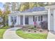 Gray house with a front porch and walkway leading to the entrance at 4034 S Mcdowell, Pittsboro, NC 27312