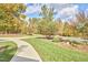 Landscaped yard with a curved walkway leading to the house at 4034 S Mcdowell, Pittsboro, NC 27312
