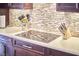 Kitchen detail showing cooktop and stylish backsplash at 4034 S Mcdowell, Pittsboro, NC 27312
