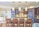Modern kitchen boasts granite island and stainless steel appliances at 4034 S Mcdowell, Pittsboro, NC 27312