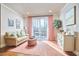 Bright living room with coral accents and access to a deck at 4034 S Mcdowell, Pittsboro, NC 27312