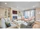 Spacious living room features built-in shelving, fireplace, and ample natural light at 4034 S Mcdowell, Pittsboro, NC 27312