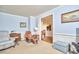 Living room with recliner, ottoman, and view into kitchen at 4034 S Mcdowell, Pittsboro, NC 27312