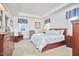 Spacious main bedroom with wood furniture and large windows at 4034 S Mcdowell, Pittsboro, NC 27312
