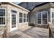 Stone exterior and wooden deck with access to backyard at 430 Federal Rd, Benson, NC 27504
