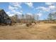 Spacious backyard with mature trees and open space at 430 Federal Rd, Benson, NC 27504