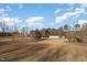 Large backyard with detached garage and basketball court at 430 Federal Rd, Benson, NC 27504