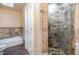 Bathroom with shower, toilet and tile flooring at 430 Federal Rd, Benson, NC 27504