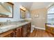 Bathroom boasts a double vanity and granite countertop at 430 Federal Rd, Benson, NC 27504