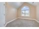 Cozy bedroom with neutral walls and carpet flooring at 430 Federal Rd, Benson, NC 27504