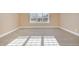 Bright bedroom with large windows and carpet flooring at 430 Federal Rd, Benson, NC 27504
